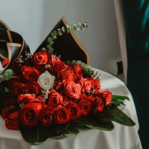 Bouquet of Red Roses Lying on a Table